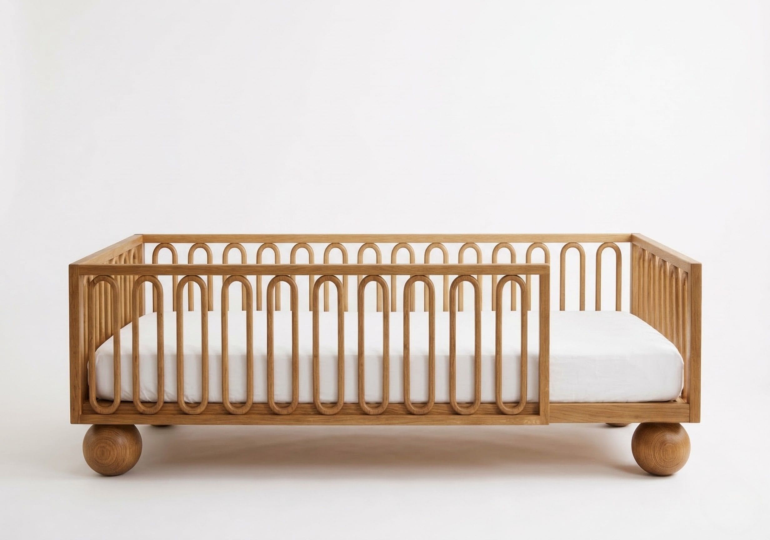 Petite Rêves Lune Floor Bed in Oak finish in neutral nursery